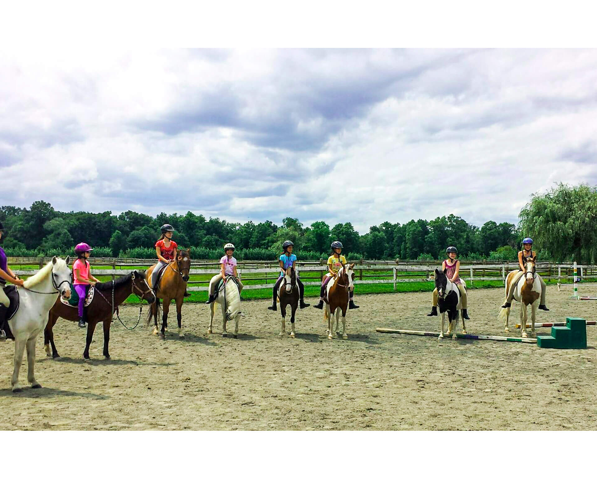 Girls On Horseback in Circle